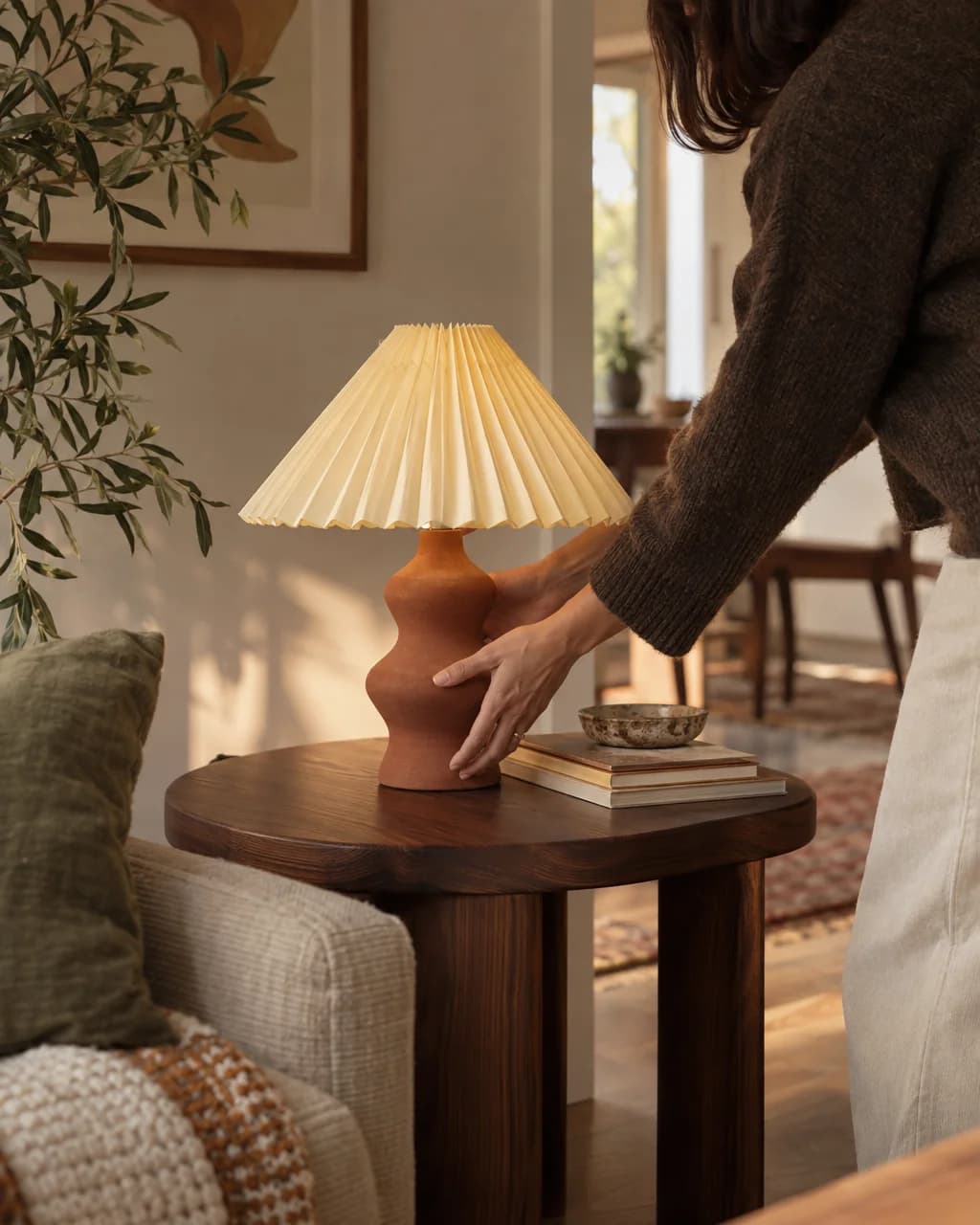 Creator-style room scene with a fictional terracotta table lamp